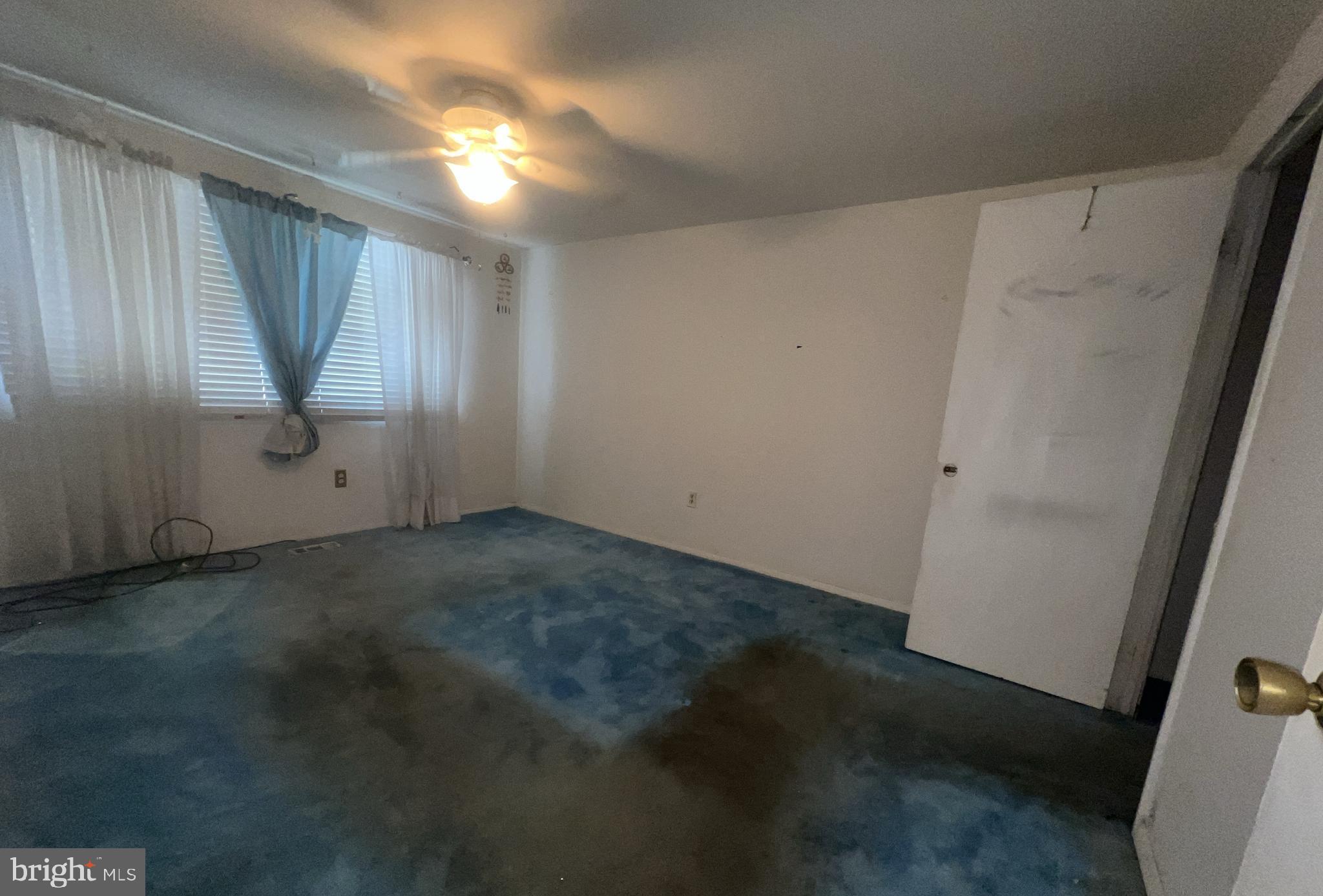 1723 Gabriel Court Crofton, MD 21114 - Photo 20 of 46 an empty room with windows and entrance