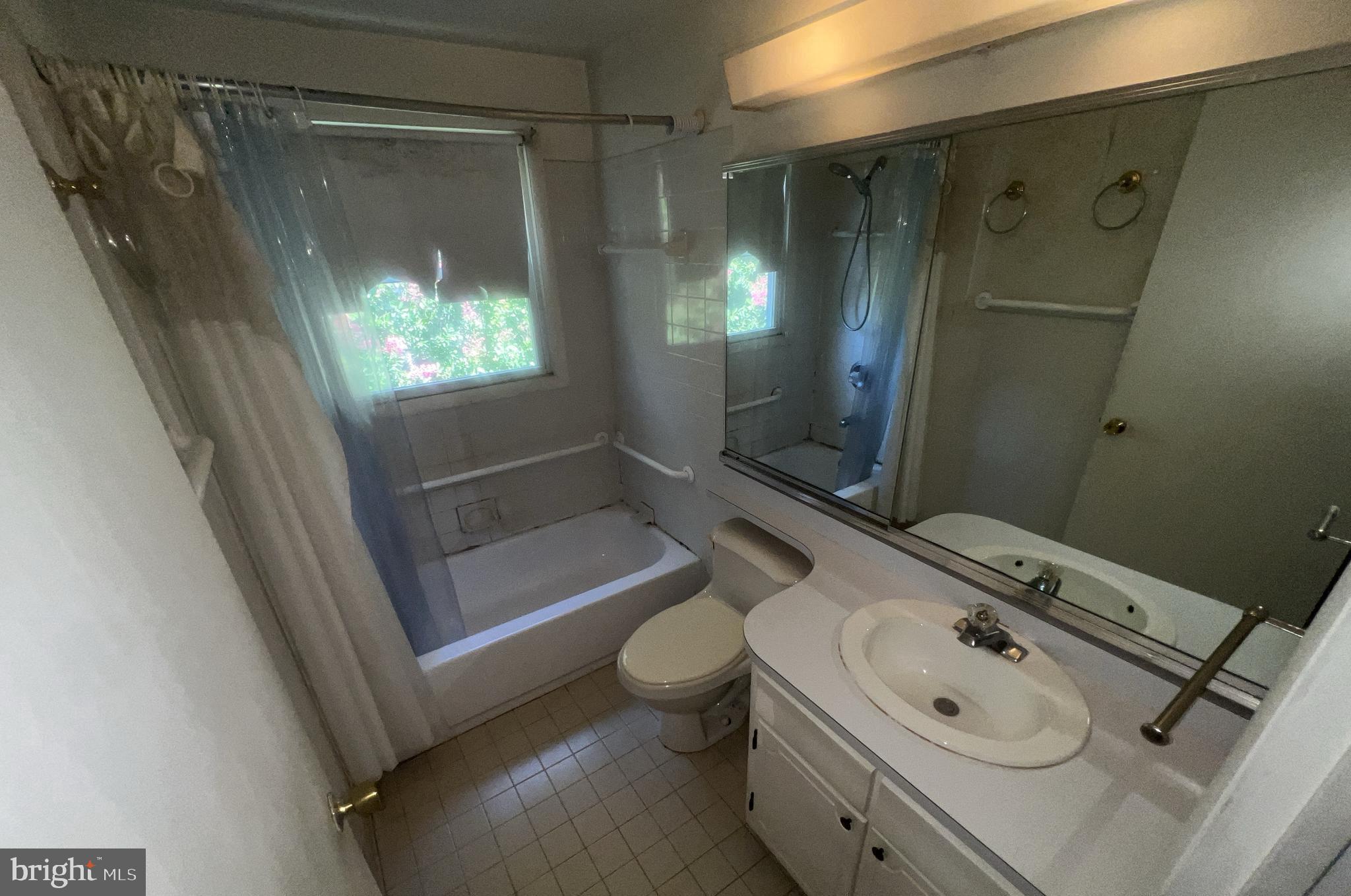 1723 Gabriel Court Crofton, MD 21114 - Photo 27 of 46 a bathroom with a sink a toilet and shower