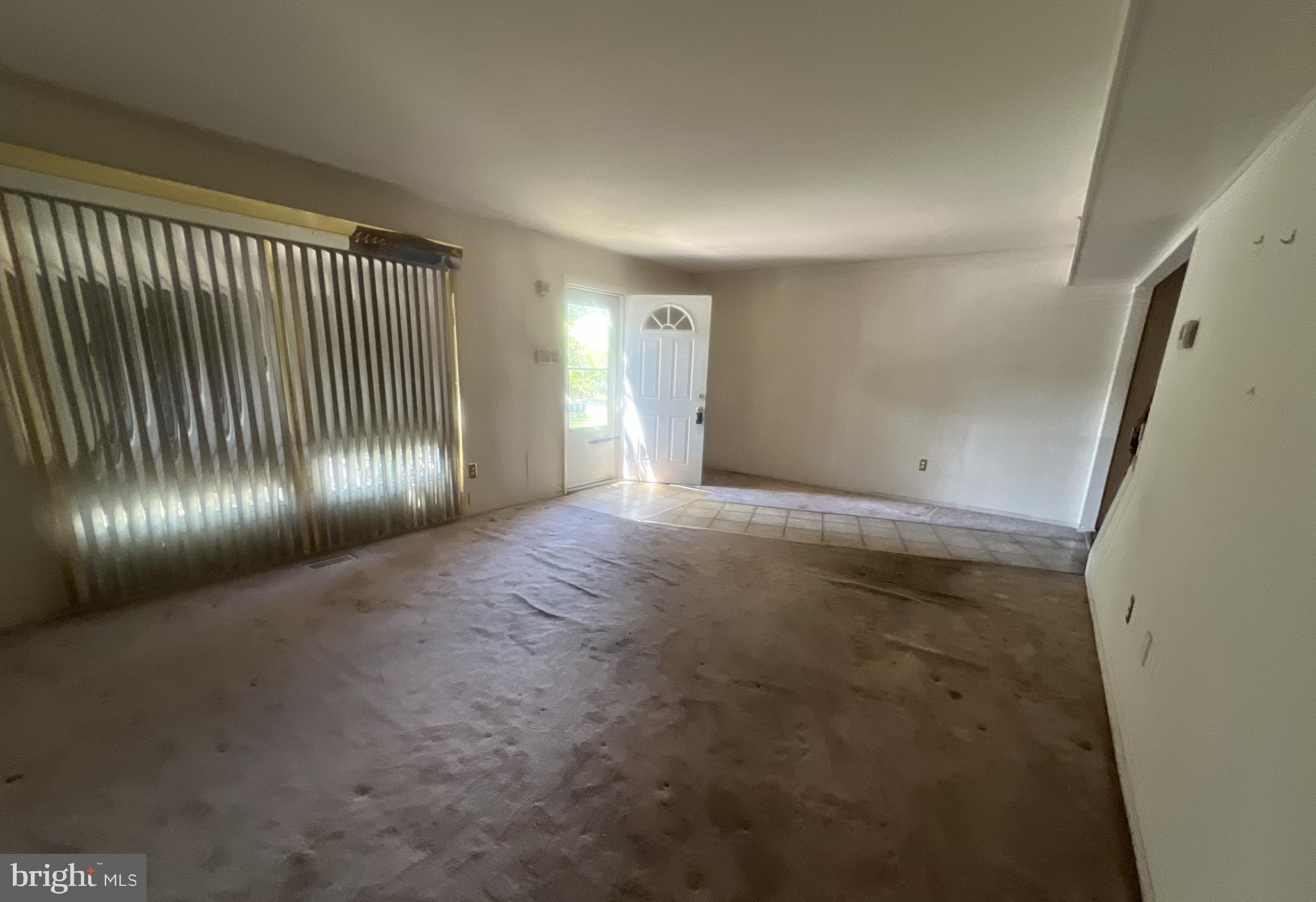 1723 Gabriel Court Crofton, MD 21114 - Photo 7 of 46 a view of an empty room with brick walls