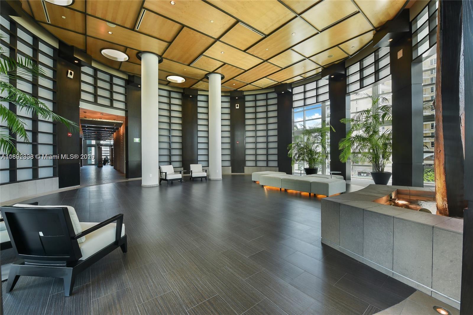 900 Brickell Key Boulevard, Unit 2602 Miami, FL 33131 - Photo 2 of 29 a view of outdoor space with seating area