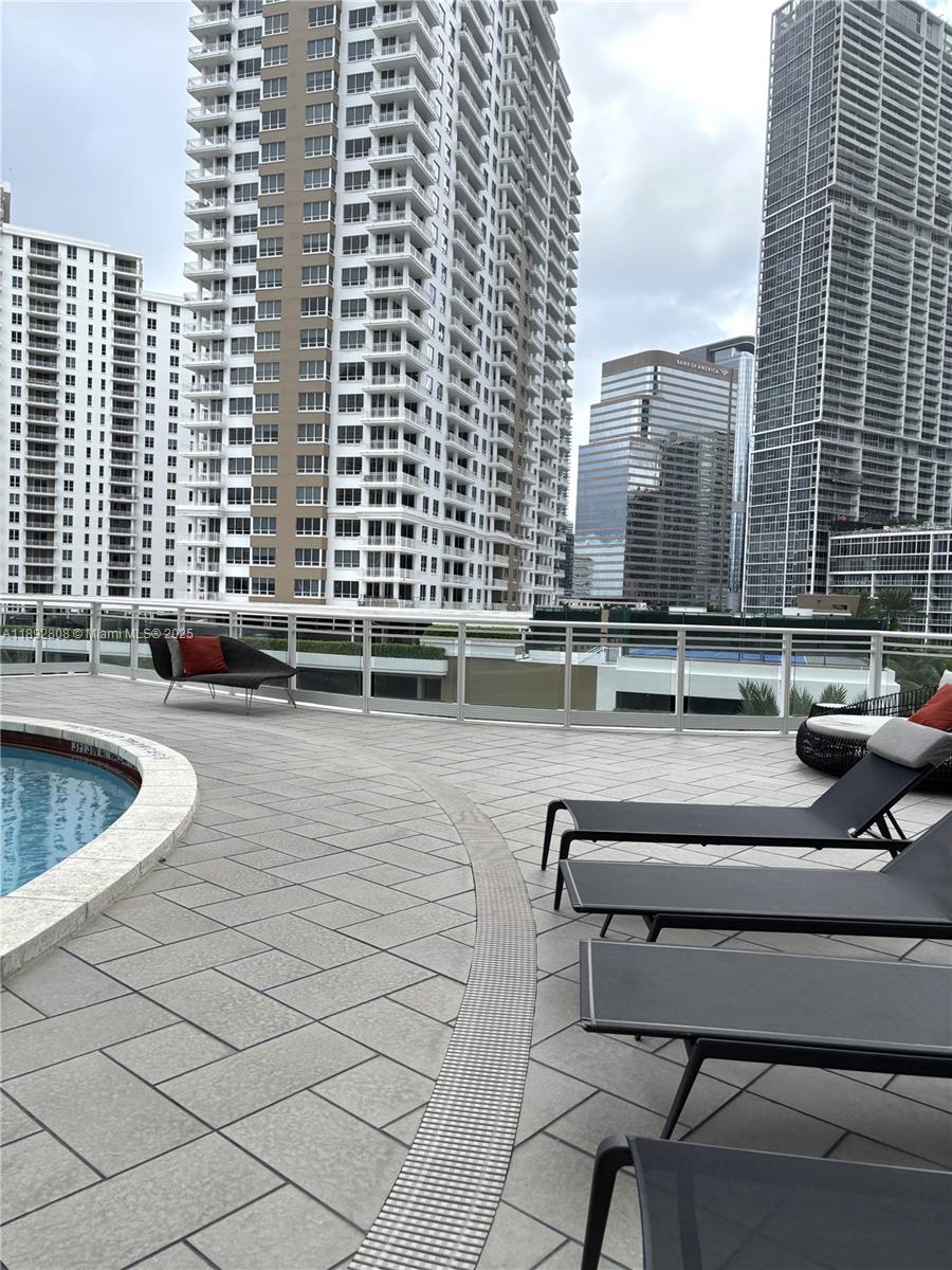 900 Brickell Key Boulevard, Unit 2602 Miami, FL 33131 - Photo 25 of 29 a view of balcony with couch