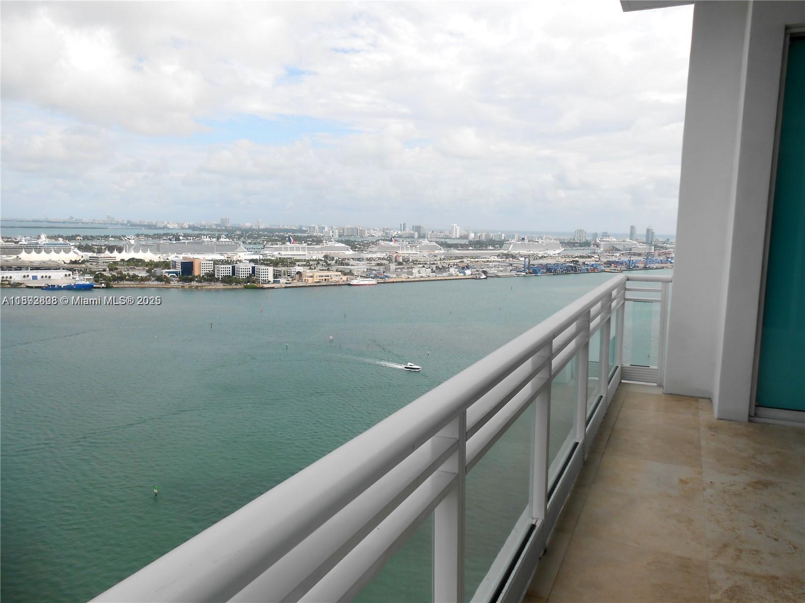 900 Brickell Key Boulevard, Unit 2602 Miami, FL 33131 - Photo 10 of 29 a view of city and a lake view