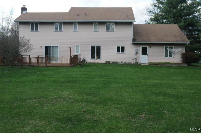 809 Blair Road Bethlehem, PA 18017 - Photo 3 of 14 Rear View of the Home with Deck and Yard