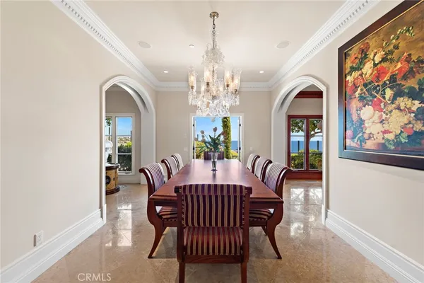a view of a dining room with furniture and window