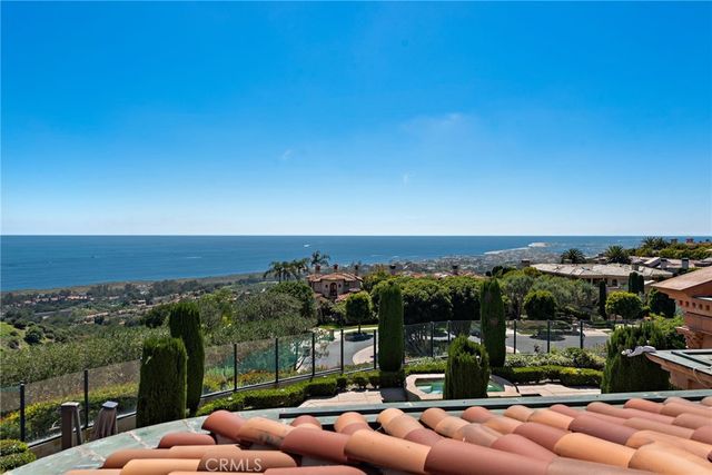 a large kitchen with a large counter top appliances and cabinets