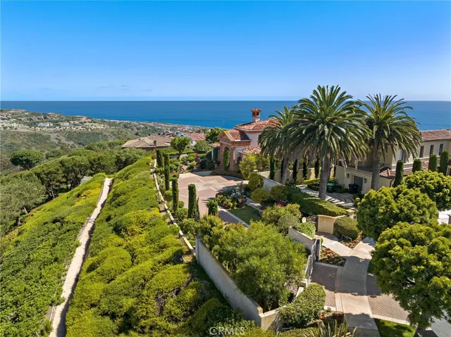 a view of a yard with an ocean