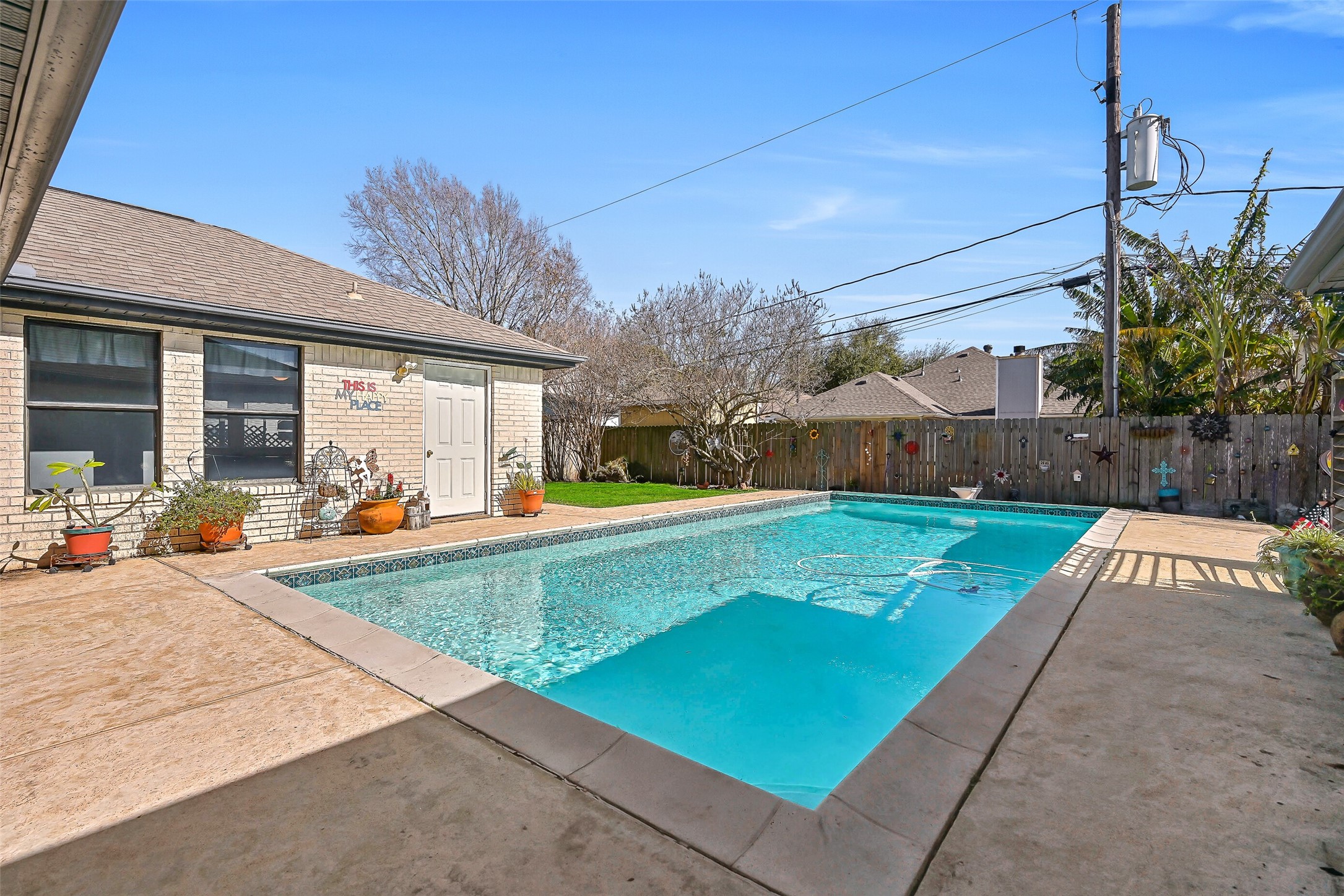 4721 Willow Street Pasadena, TX 77586 - Photo 28 of 31 a view of a backyard with a patio