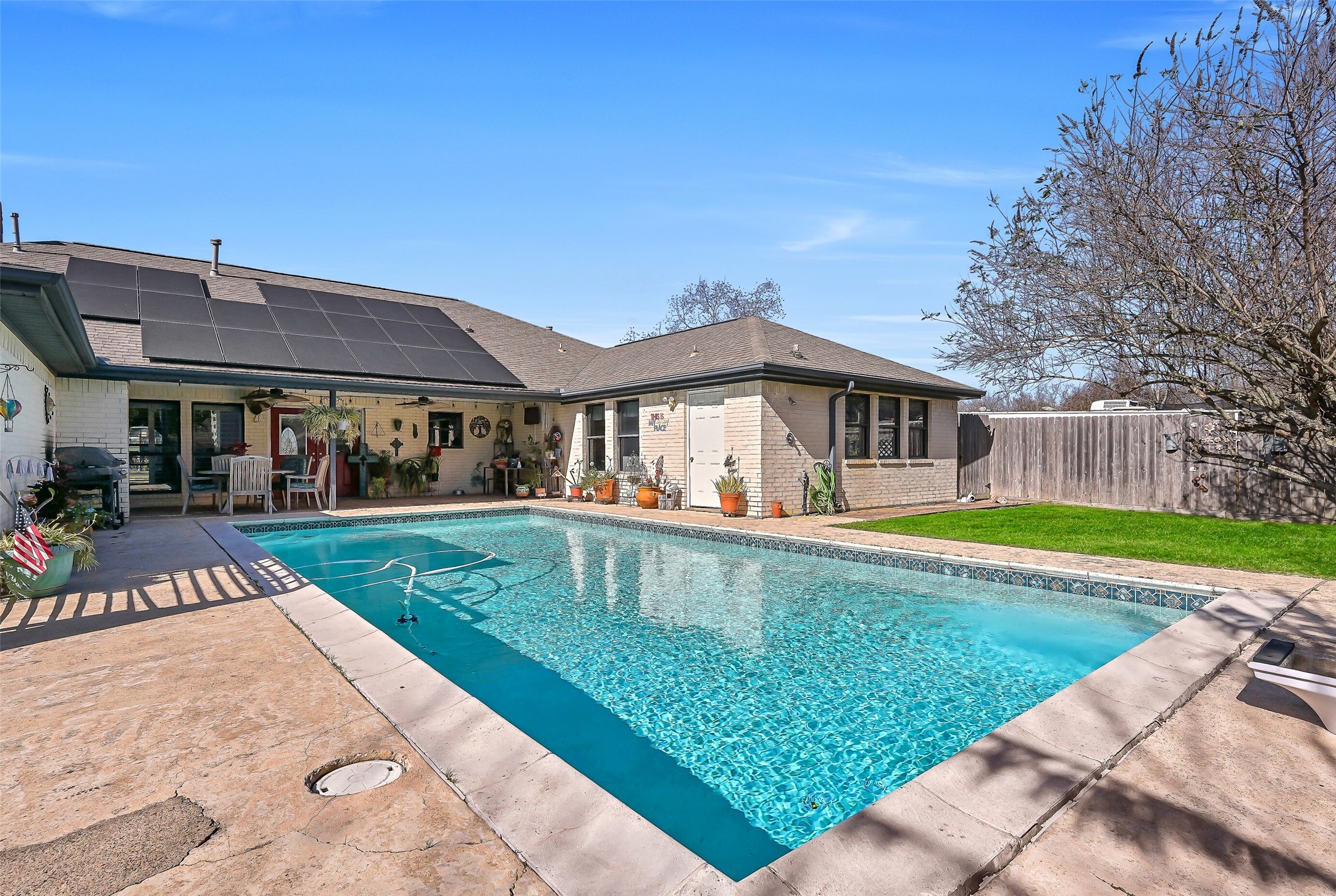 4721 Willow Street Pasadena, TX 77586 - Photo 31 of 31 a view of a house with a swimming pool