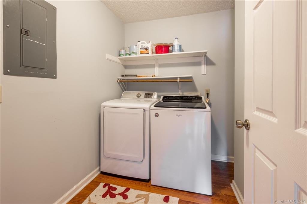 5523 Hornaday Road, Unit G Greensboro, NC 27409 - Photo 17 of 20 a utility room with dryer and washer