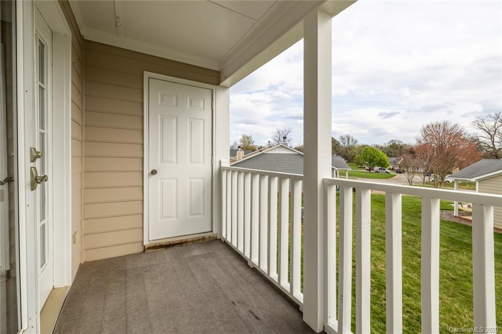 5523 Hornaday Road, Unit G Greensboro, NC 27409 - Photo 18 of 20 a view of a balcony
