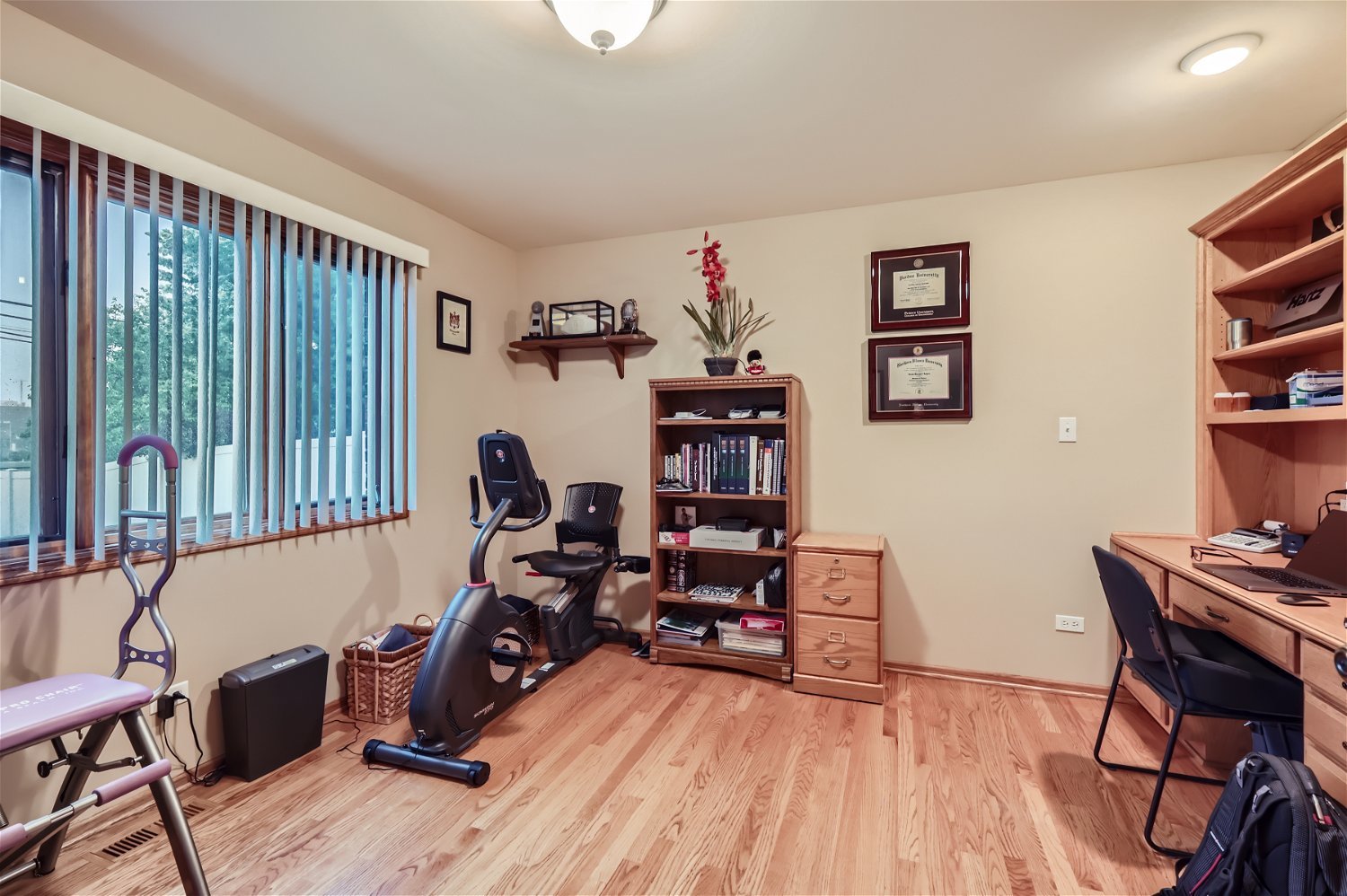 18255 Cork Road Tinley Park, IL 60477 - Photo 11 of 29 a view of a workspace with furniture and a window