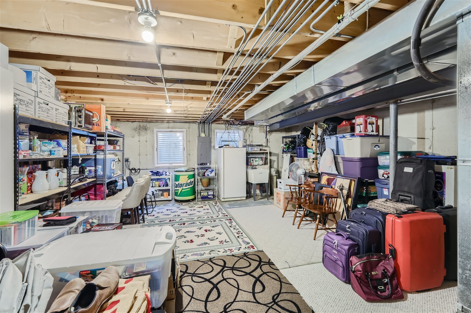 18255 Cork Road Tinley Park, IL 60477 - Photo 26 of 29 a room with lots of furniture and clutter