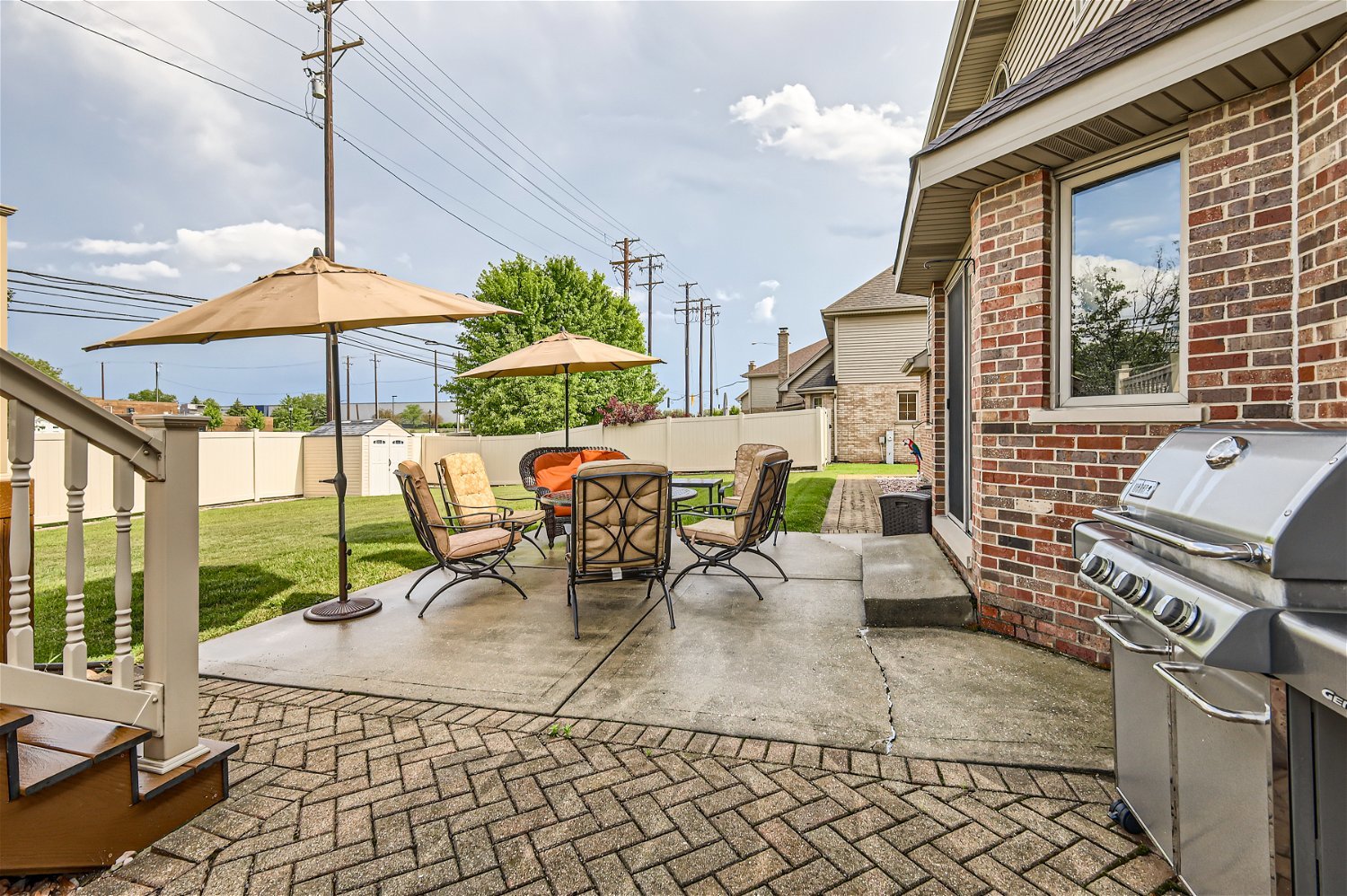 18255 Cork Road Tinley Park, IL 60477 - Photo 27 of 29 a view of a patio with a table chairs and a floor to ceiling window