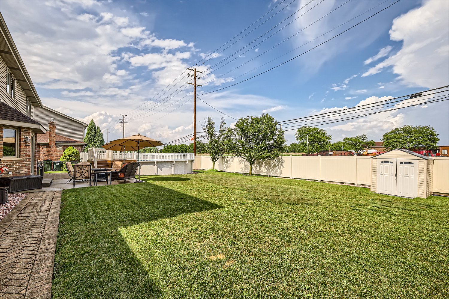 18255 Cork Road Tinley Park, IL 60477 - Photo 28 of 29 a view of a garden and basketball court