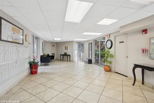 a view of a entryway and workspace