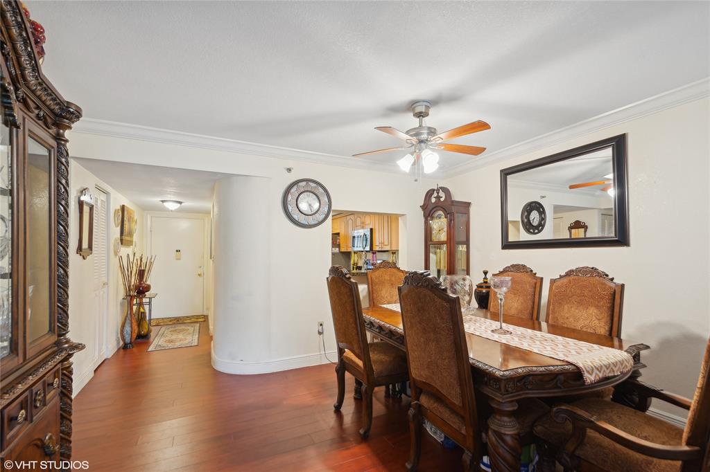 3940 Inverrary Boulevard, Unit 403A Lauderhill, FL 33319 - Photo 8 of 34 a dining room with furniture and a window