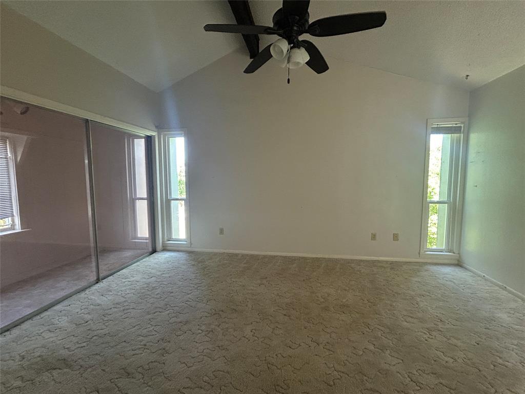 13 Rim Rock Road Goldthwaite, TX 76844 - Photo 11 of 30 an empty room with chandelier fan