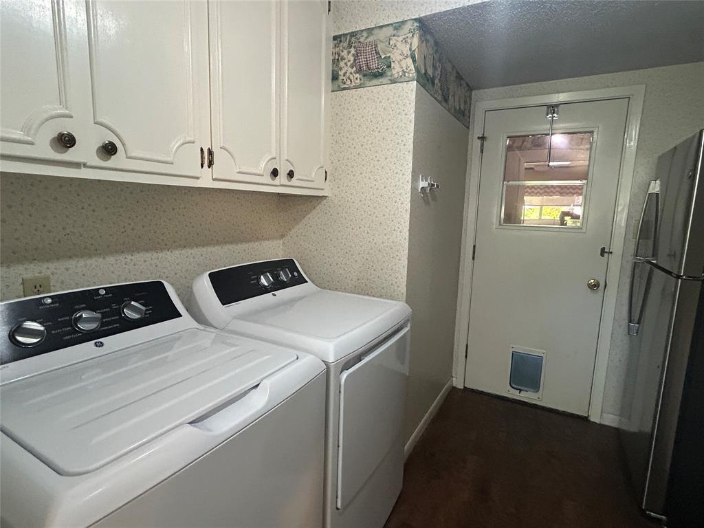 13 Rim Rock Road Goldthwaite, TX 76844 - Photo 26 of 30 a utility room with dryer and washer