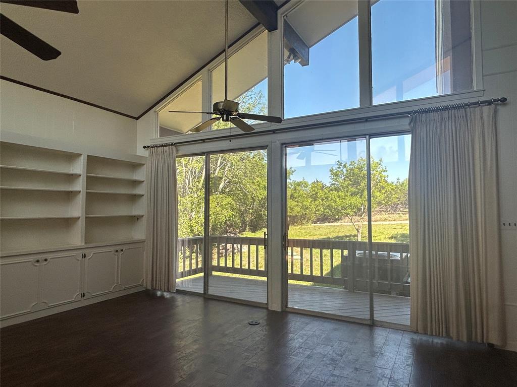 13 Rim Rock Road Goldthwaite, TX 76844 - Photo 4 of 30 a view of an empty room with a window