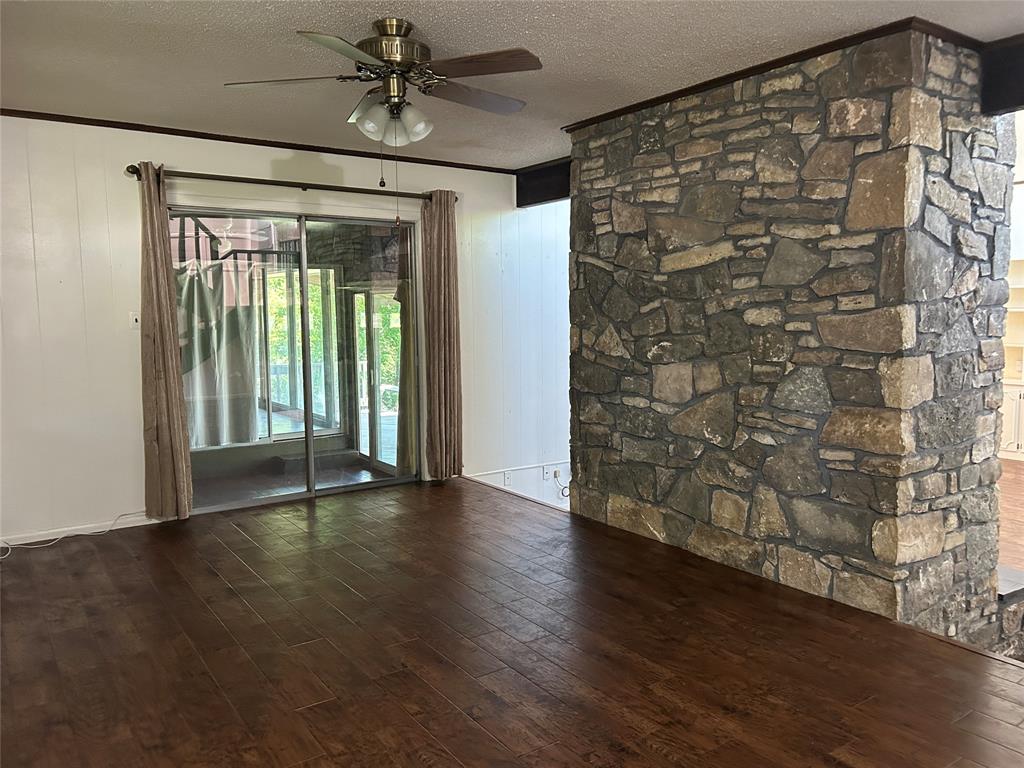 13 Rim Rock Road Goldthwaite, TX 76844 - Photo 7 of 30 a view of an empty room with a window