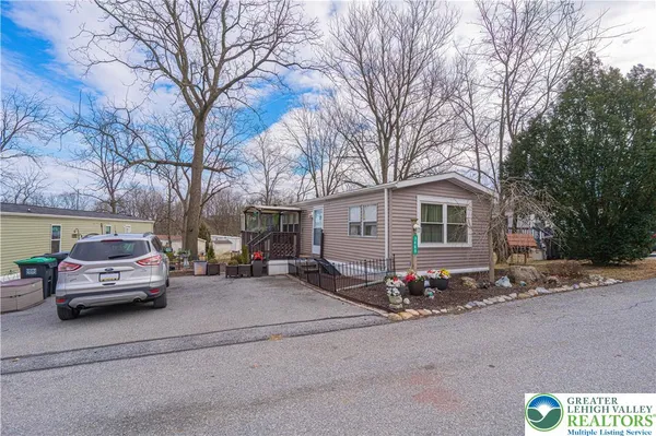 a car parked in front of a house
