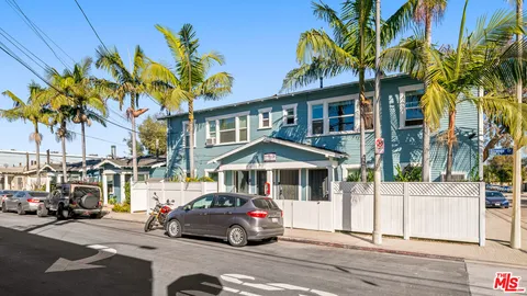 a car parked in front of a house
