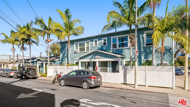 a car parked in front of a house