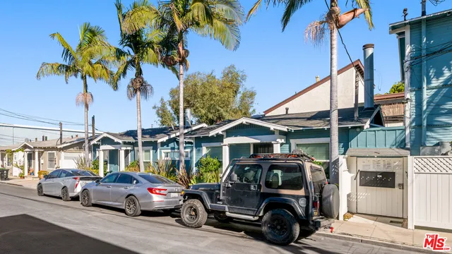 a car parked in front of a house