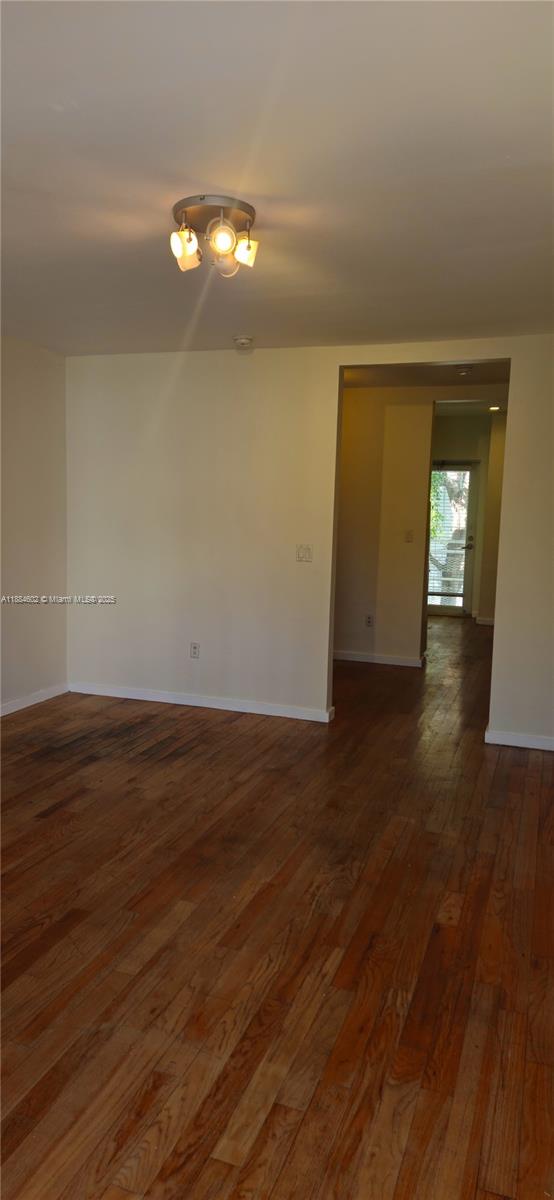 745 13th Street, Unit 16 Miami Beach, FL 33139 - Photo 25 of 27 a view of empty room with wooden floor