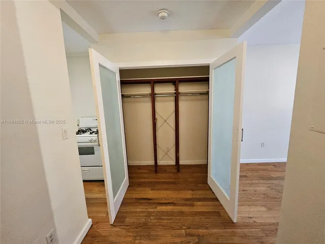 a view of entryway with wooden floor