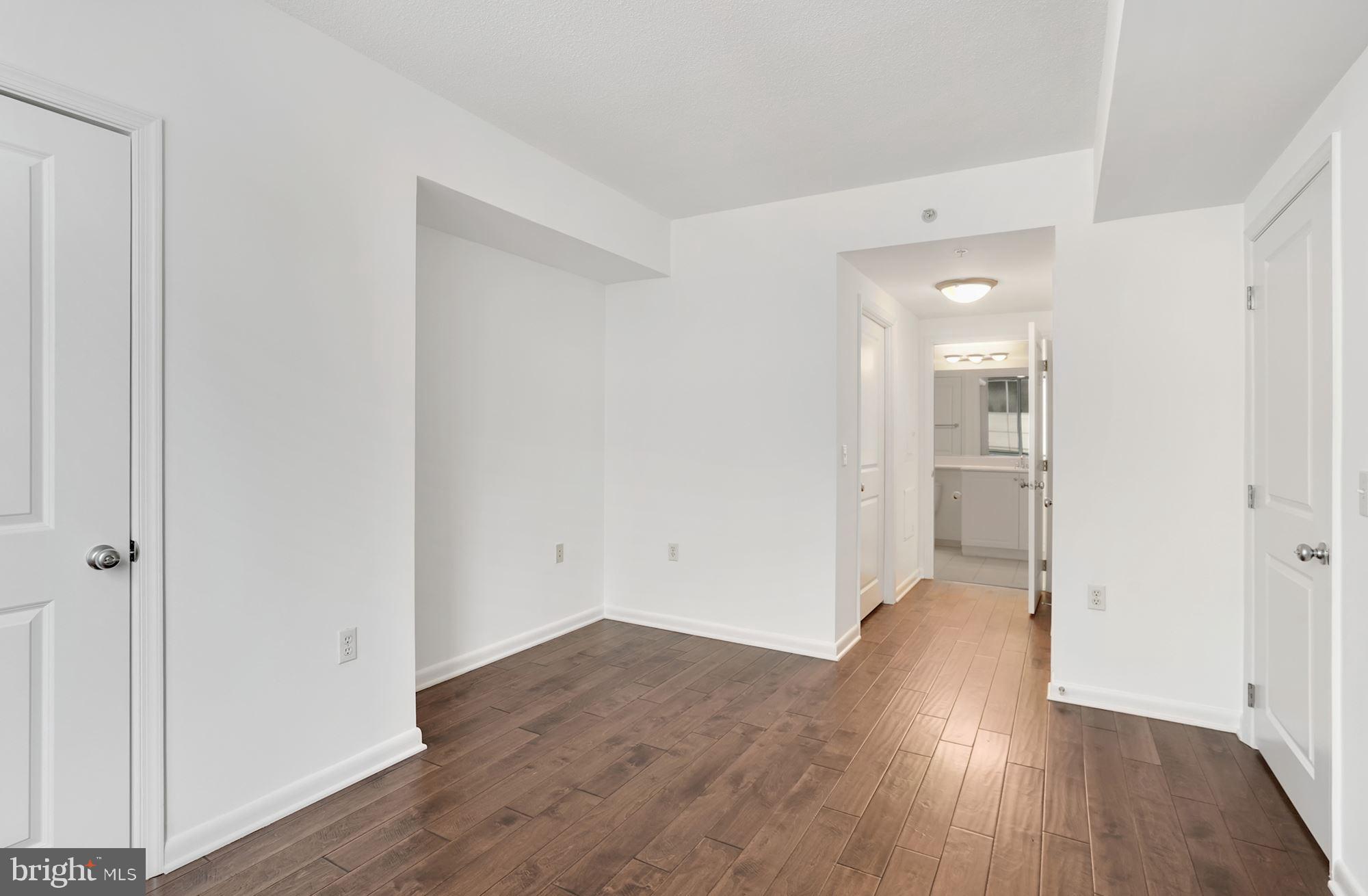 851 North Glebe Road, Unit 418 Arlington, VA 22203 - Photo 14 of 25 Bedroom view into bathroom