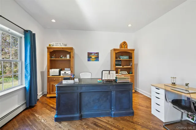 a workspace with furniture and window