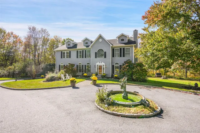 a view of a backyard of the house