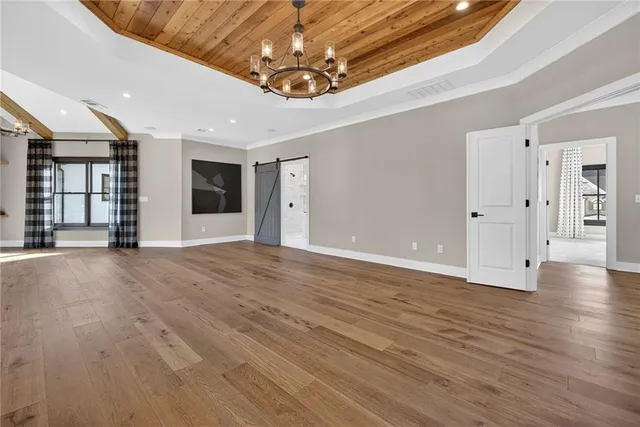 a bathroom with a sink toilet a mirror and shower