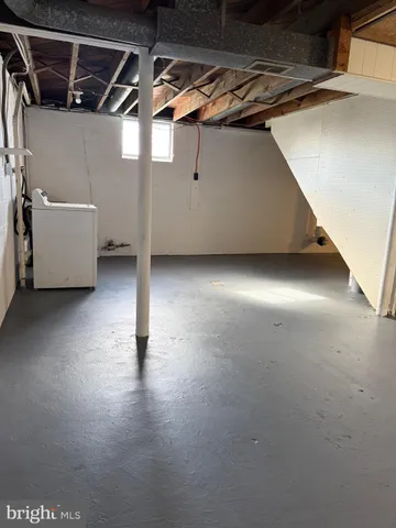 a view of a room with wooden walls