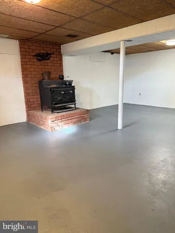 a view of a garage with wooden floor