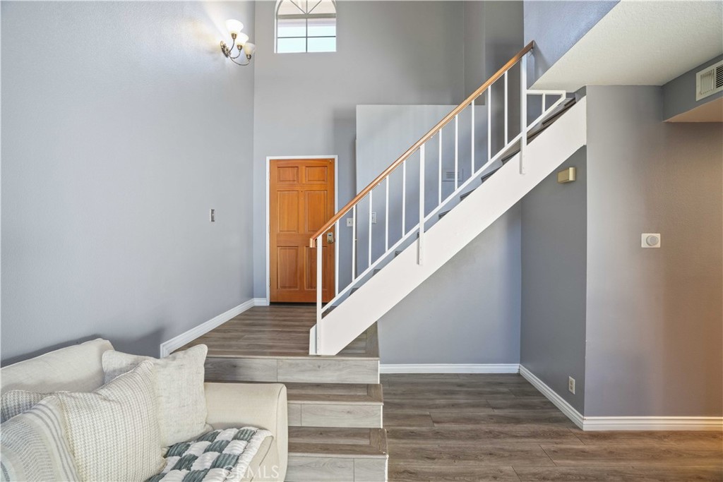 28345 Seco Canyon Road, Unit 97 Saugus, CA 91390 - Photo 16 of 38 a view of entryway and hall with wooden floor