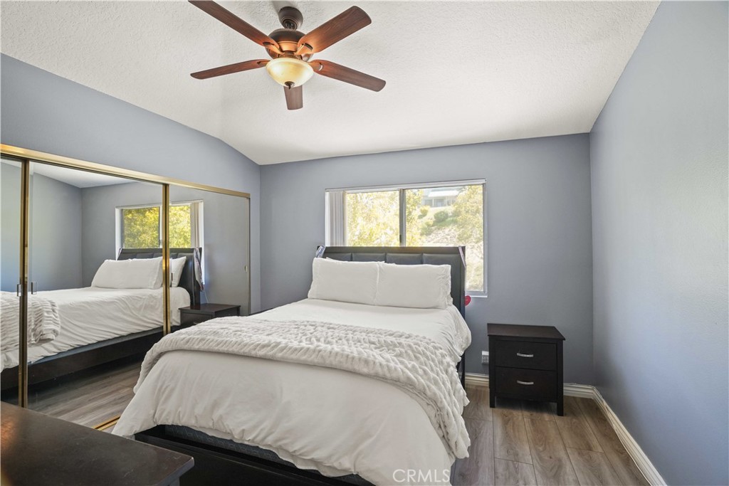 28345 Seco Canyon Road, Unit 97 Saugus, CA 91390 - Photo 18 of 38 a bedroom with a bed and a window