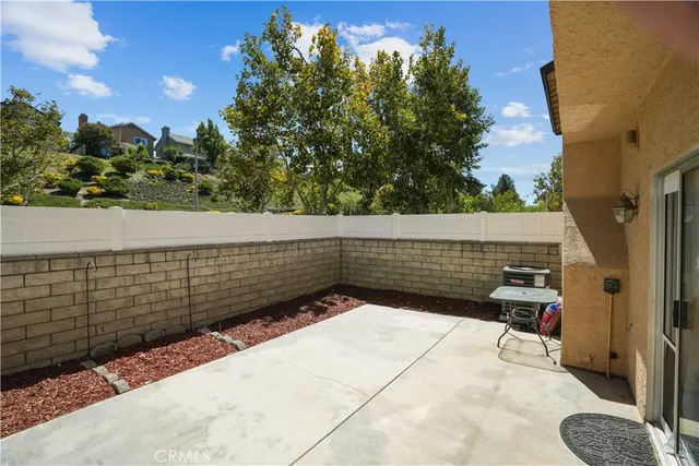 a view of backyard of a house
