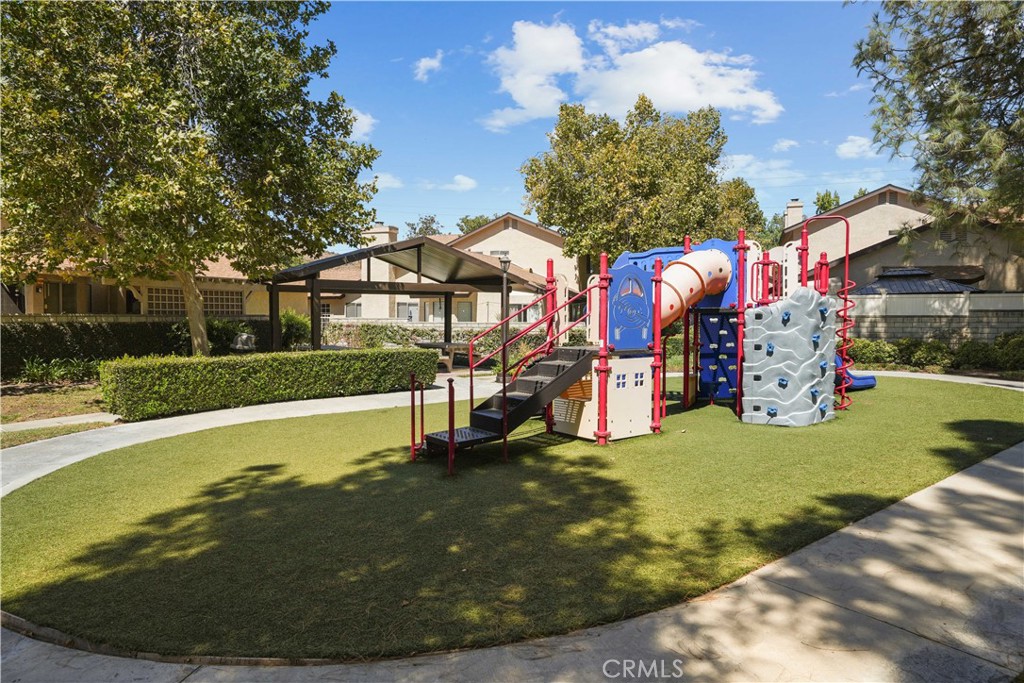 28345 Seco Canyon Road, Unit 97 Saugus, CA 91390 - Photo 33 of 38 a view of a house with a swimming pool