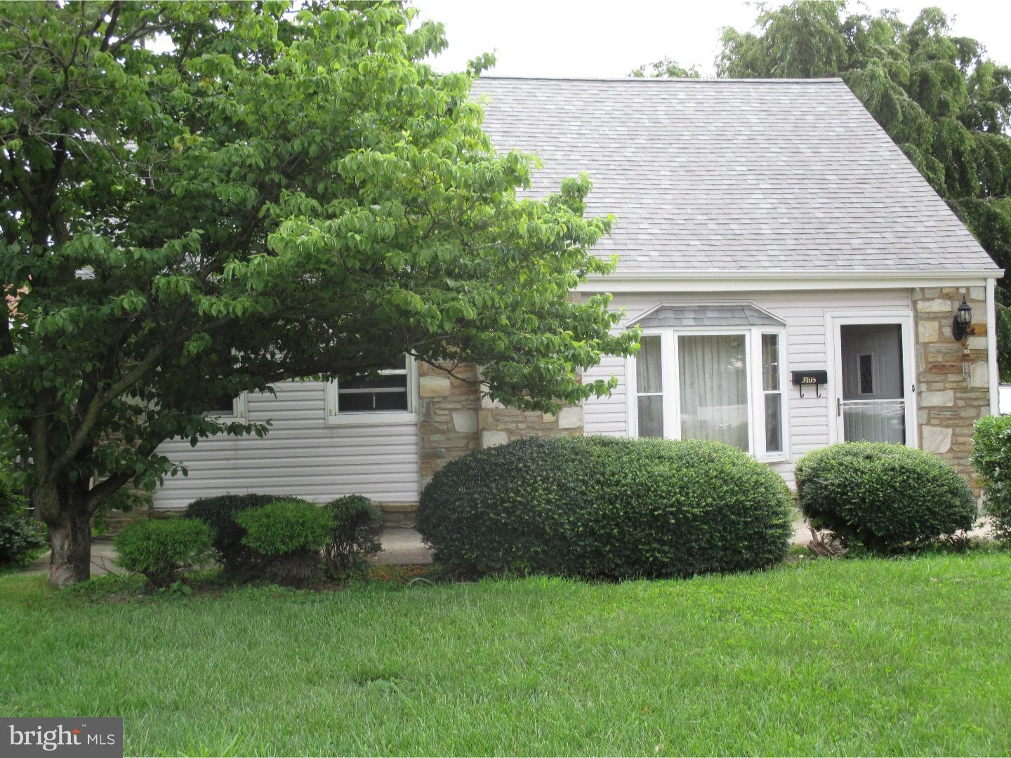 3105 Byberry Road Philadelphia, PA 19154 - Photo 1 of 7 a front view of a house with a garden