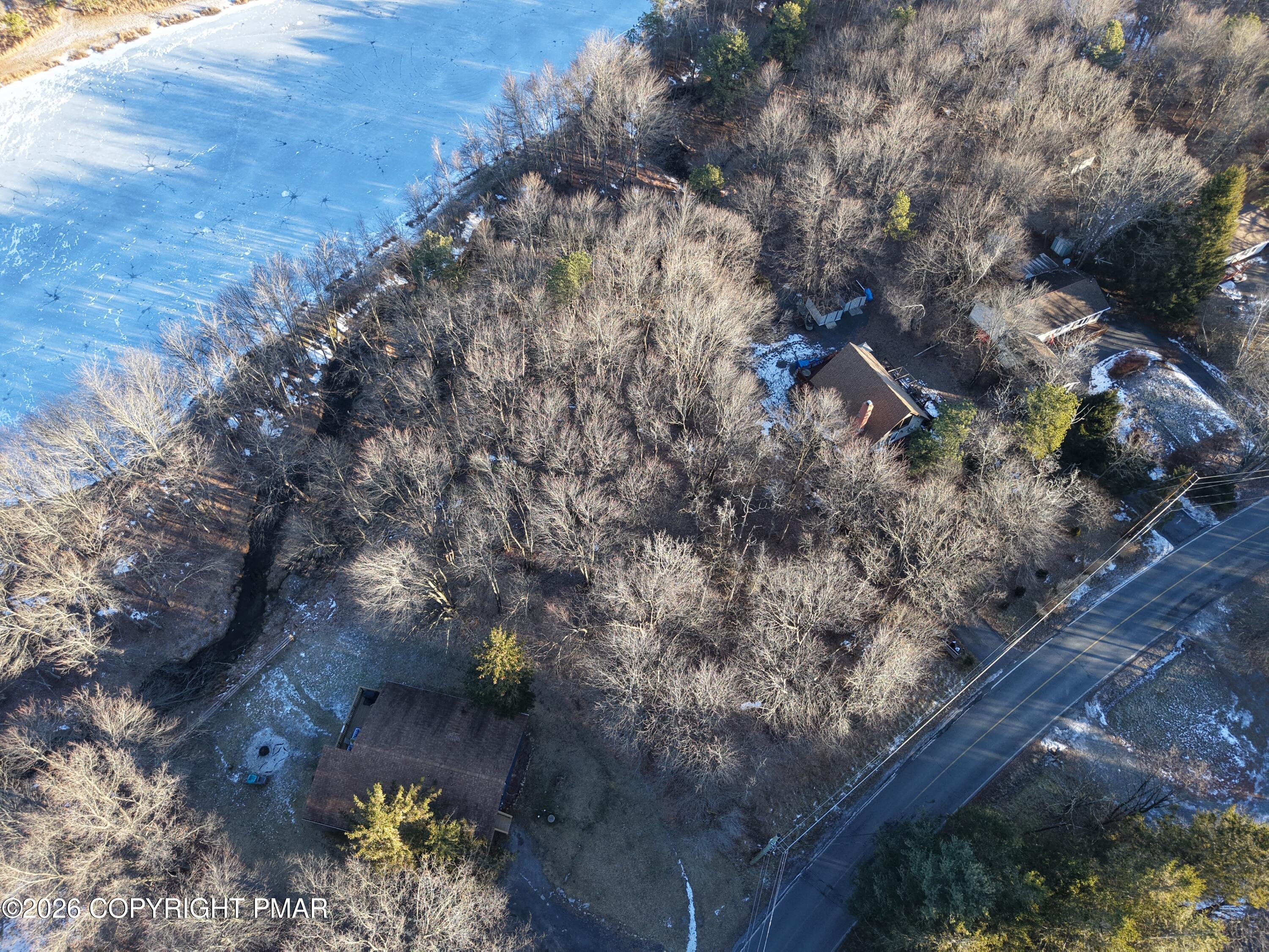 119 Mountain Road Albrightsville, PA 18210 - Photo 4 of 18 a view of a tree in a yard