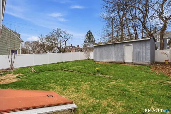 a backyard of a house with lots of green space