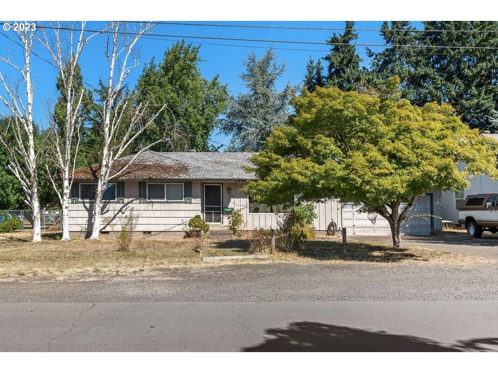 4056 North Street Springfield, OR 97478 - Photo 1 of 34 a front view of a house with a yard