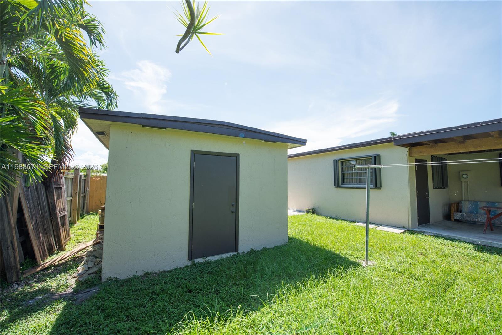18900 Southwest 313th Street Homestead, FL 33030 - Photo 23 of 40 a house with a yard
