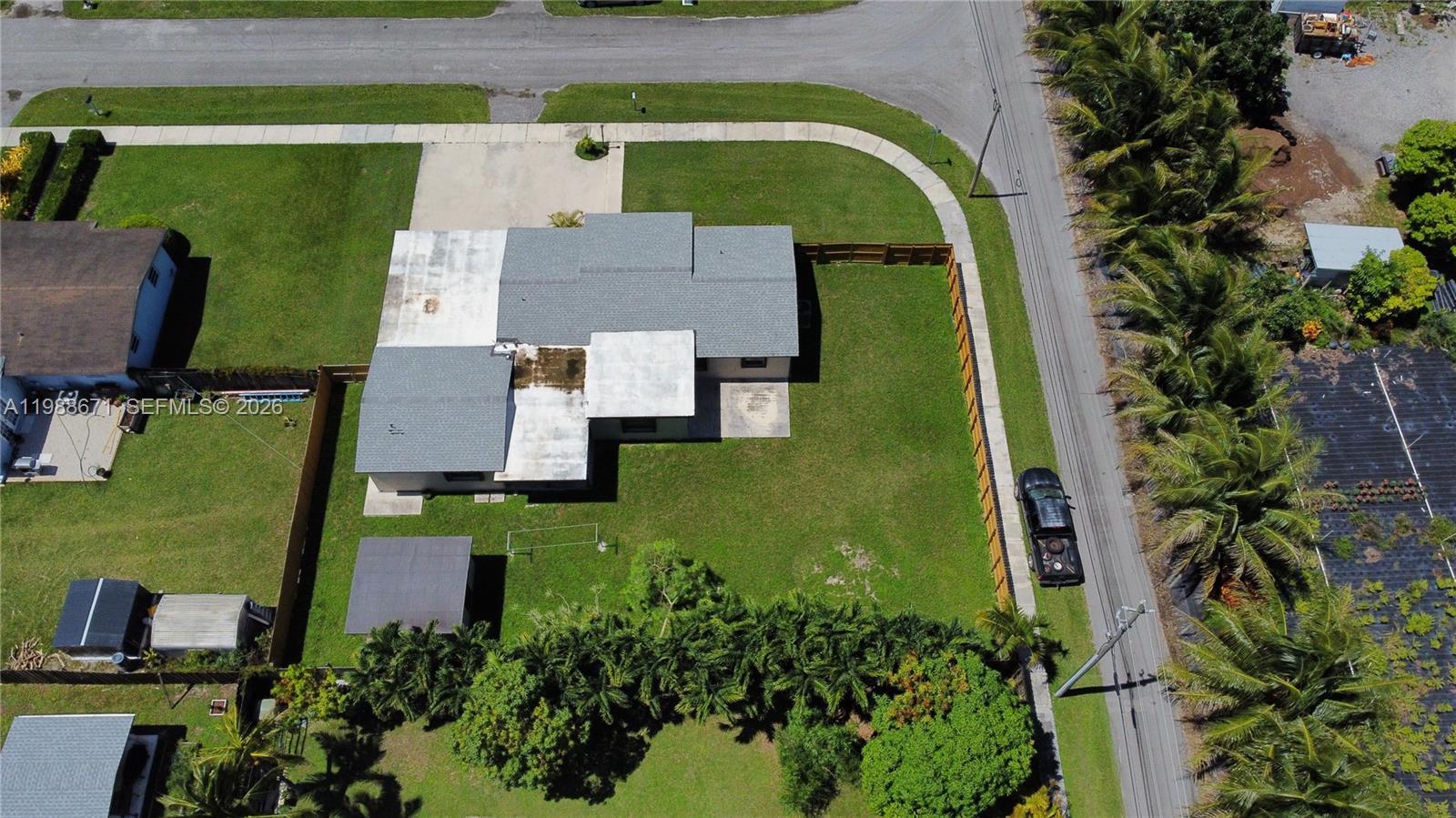 18900 Southwest 313th Street Homestead, FL 33030 - Photo 34 of 40 an aerial view of a house with swimming pool
