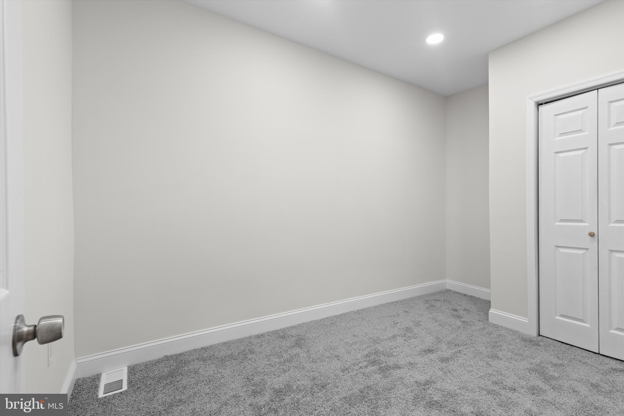 2816 The Alameda Baltimore, MD 21218 - Photo 18 of 20 an empty room with a workbench