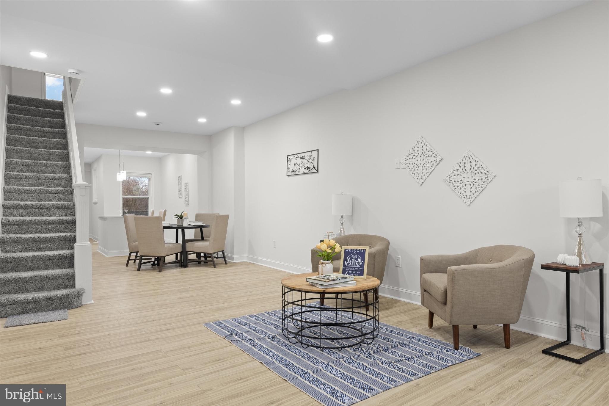 2816 The Alameda Baltimore, MD 21218 - Photo 3 of 20 a living room with furniture and a table