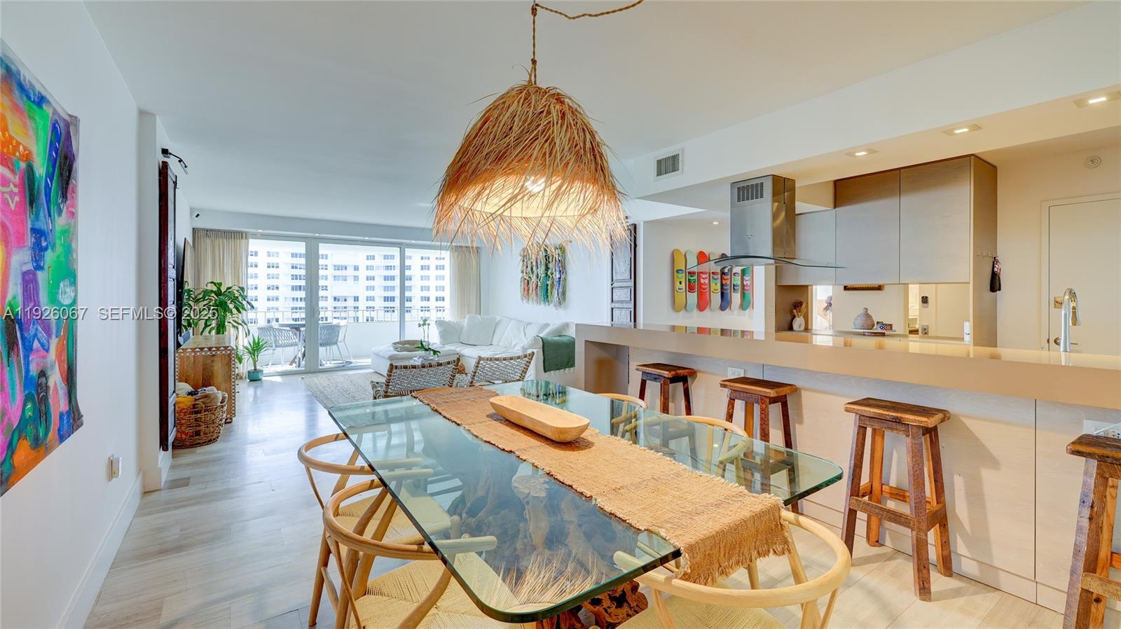 177 Ocean Ln Drive, Unit 707 Key Biscayne, FL 33149 - Photo 13 of 29 a dining room with furniture and a chandelier