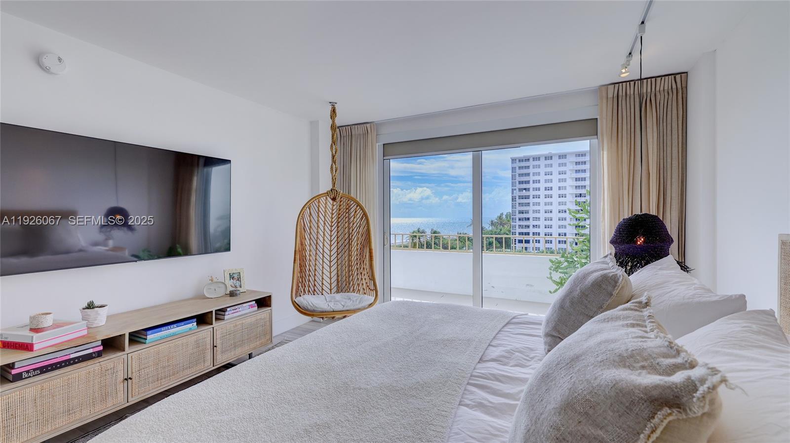 177 Ocean Ln Drive, Unit 707 Key Biscayne, FL 33149 - Photo 16 of 29 a bed room with a bed and a window